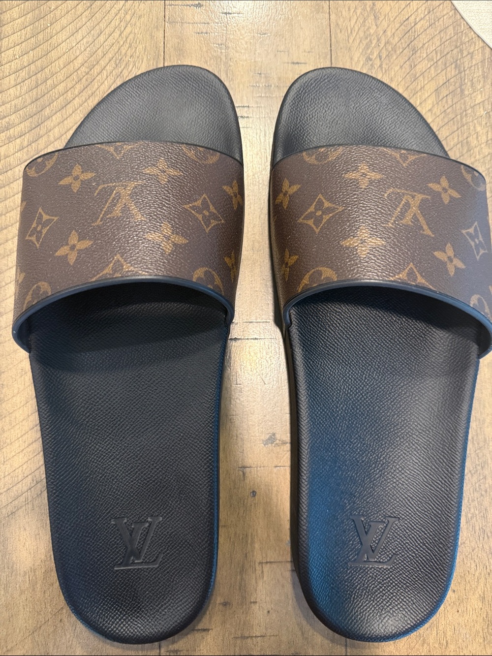 Men’s LV waterfront mule monogram slides.